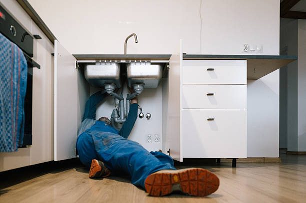 Professional Emergency Plumber technician working in Zion, IL